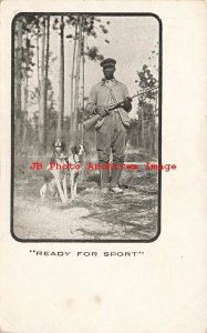 Black Americana, Man with Shotgun along with Two Dogs Ready for Hunting