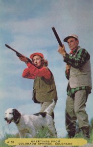 Greetings Colorado Springs CO Hunters Hunting Dog Spaniel Rifle postcard H177 