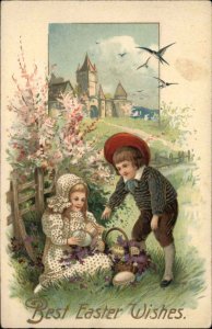 Little Boy and Girl Finding Easter Eggs c1910 Vintage Postcard