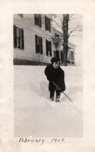 VINTAGE POSTCARD YOUNG GIRL PLOWING SNOW IN ROCKFORD MICHIGAN RPPC 1909