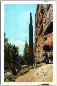 VINTAGE POSTCARD CHIMNEY ROAD SCENE ALONG THE ROAD TO CODY AT WYOMING 1925