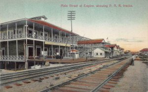 MAIN STREET AT EMPIRE P.R.R. TRAIN TRACKS PANAMA CANAL ZONE POSTCARD (c. 1910)