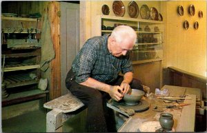 Massachusetts Old Sturbridge Village The Potter Turning A Bowl On His Wheel