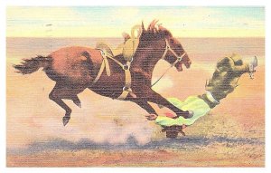 Cowboy being thrown from Bucking Broncho