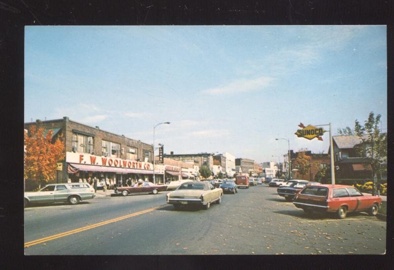 GREENFIELD MASS. DOWNTOWN STREET SCENE WOOLWORTH STORE OLD CARS POSTCARD