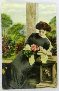 Young Man Surprises Woman with Pink Bouquet of Flowers - Posted Vintage Postcard