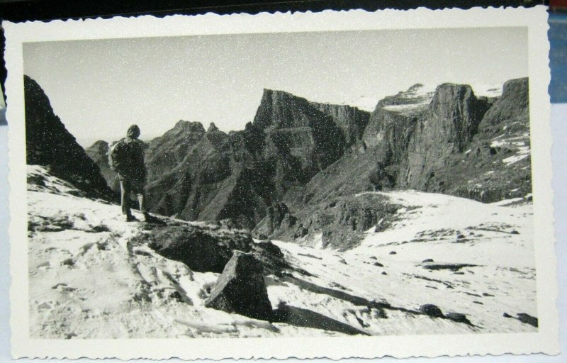 South Africa Drakenberg scene and climber RPPC - posted 1957