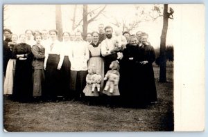 c1910s Family Gathering Little Girls With Dolls Toys RPPC Photo Antique Postcard