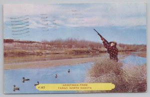 State View~Hunter & Fake Ducks In River Fargo North Dakota~Vintage Postcard