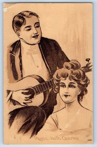 1909 Couple Man Playing Guitar Music Hath Charms Elysian Minnesota MN Postcard