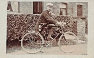 MAN & BICYCLE WITH CARBIDE LAMP ~1910s BRITISH REAL PHOTO POSTCARD