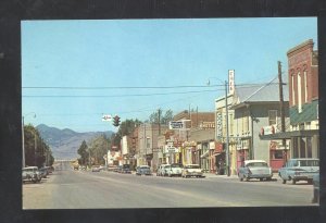 WHITEHALL MONTANA DOWNTOWN STREET SCENE OLD CARS STORES VINTAGE POSTCARD