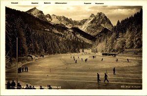 RPPC Ice Skating Riesersee towards Zugspitze Germany Real Photo Postcard