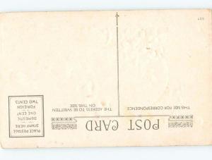 Unused Divided-Back Easter CHICK ON YELLOW EGG WITH BLUE RIBBON o6710