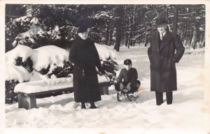 Family Real Photo 1940 Boy on Sledge pulled by Mother Snow Forest postcard