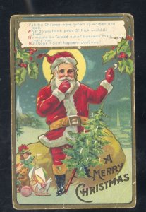 MERRY CHRISTMAS SANTA CLAUS WITH RED ROBE TOYS TREE TOLEDO ILL VINTAGE POSTCARD