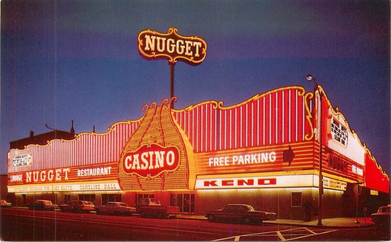 Postcard Nevada Night neon 1950s Nugget Carson City autos Siera 23-7794