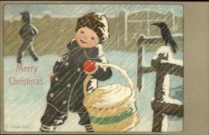 Christmas - Happy Little Boy Basket in Snowstorm GASPARI c1910 Postcard