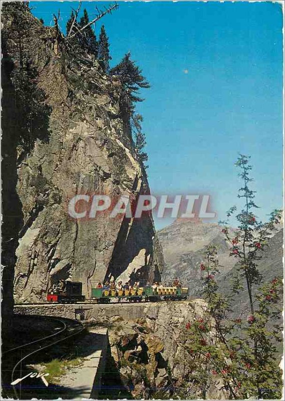 Postcard Modern Artouste Lake Train winds its ledge in the wall