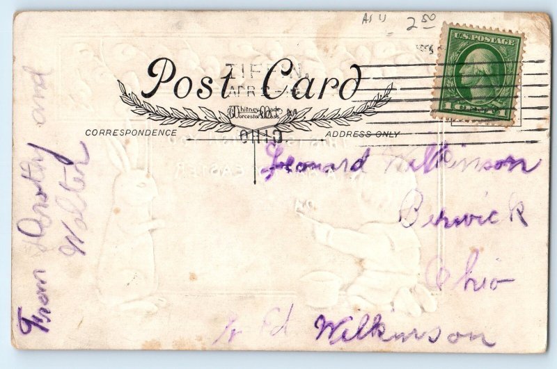 c1910's Easter Little Boy Writing Bunny Rabbit Pipe Berry Embossed Postcard