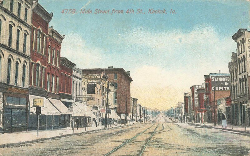 Keokuk IA Main Street From 4th Street Trolley tracks Storefronts Postcard  