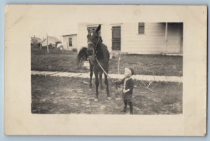 c1910's Little Boy With Horse House Scene RPPC Photo Unposted Antique Postcard