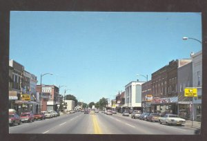 TOMAH WISCONSIN DOWNTOWN STREET SCENE OLD CARS STORES VINTAGE POSTCARD