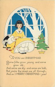 PF Volland Art Deco Christmas Postcard; Girl in Yellow Trims Tree by Window