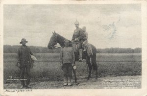 Field gendarme and small interpreter brings a captured Russian prisoner 1915