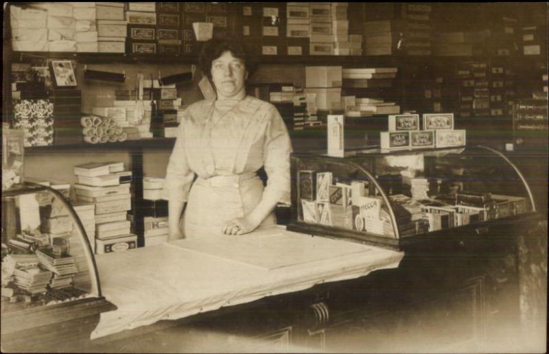 Woman Store Clerk Tailor Shop? Counter Boxes c1910 Real Photo Postcard dcn