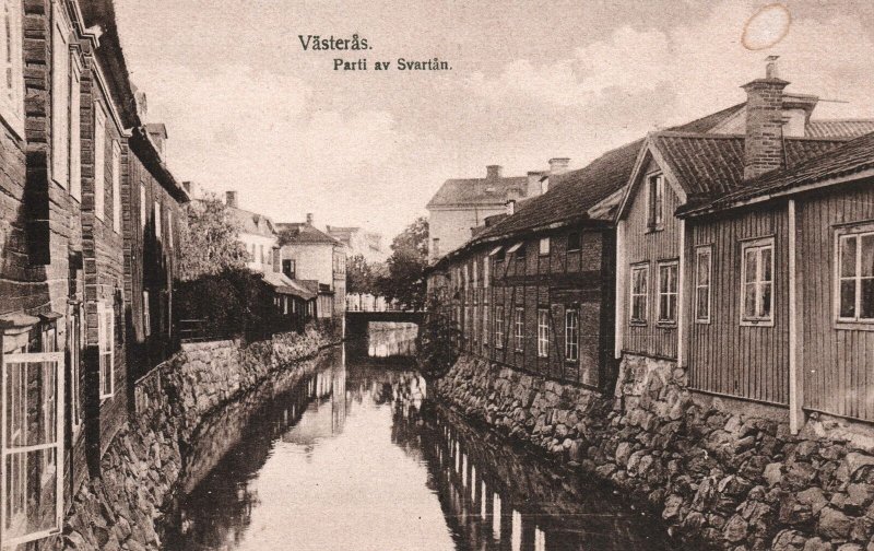VINTAGE POSTCARD HOUSES AND WATERWAY SCENE AT VASTERAS CENTRAL SWEDEN C. 1920s
