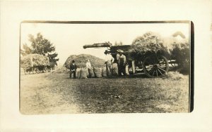 c1910 RPPC; Farm Equipment Thresher Filling Grain Sacks Unknown US location