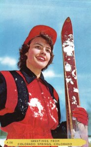 Vintage Postcard Woman Holding Snowboard Colorado Springs Colorado Greetings CO