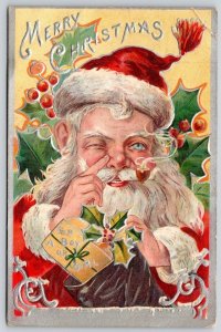 1908 WINKING SANTA CLAUS MERRY CHRISTMAS EMBOSSED VICTORIAN ANTIQUE POSTCARD