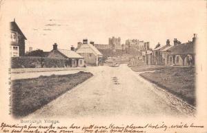 Bamburgh Village England Street Scene and Castle Antique Postcard J79442