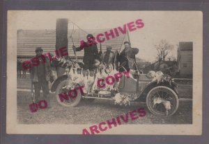 Scribner NEBRASKA RPPC c1918 JACKRABBIT HUNT Hunters Posing DEAD RABBITS Car NE