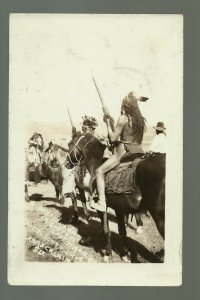 Chamberlain SOUTH DAKOTA RPPC 1930 SIOUX INDIANS Indian Horse RIFLES Headdress