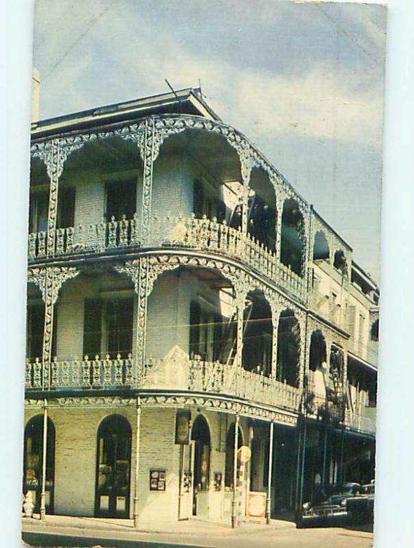 1952 old cars & SHOPS UNDER BALCONIES New Orleans Louisiana LA Q0688