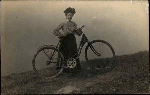 BICYCLE Woman Hat Eyeglasses Skirt c1910 Amateur Real Photo Postcard