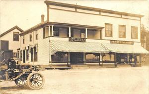 New London NH Post Office Store Fronts Old Car RP Postcard