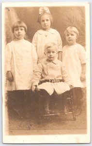 Vintage RPPC J.R. Cotner Studio Portrait Four Children Names Early 1900s