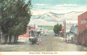 Winnemucca NV Bridge Street Horse & Wagon Storefronts  in 1910 Postcard