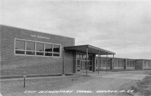 Sheldon Iowa~East Elementary School~Empty Driveway~1950s RPPC 