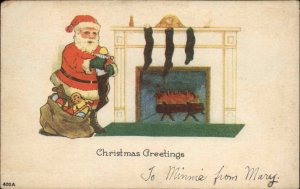 Christmas Santa Claus Fireplace Stockings c1900s-10s Postcard