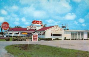 Marshalltown Iowa Lloyds Restaurant Street View Vintage Postcard K57446