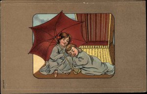 Sweet Boy and Girl Children Nap Under Umbrella Beach c1910 Vintage Postcard