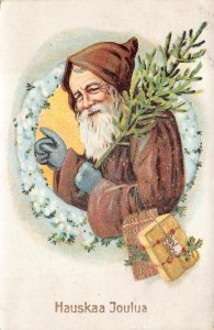 HAUSKAA JOULUA CHRISTMAS HOLIDAY BROWN SUITED SANTA CLAUS FINLAND POSTCARD 1929