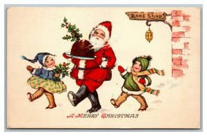 Vintage 1927 Christmas Postcard Santa Claus with Cake Mistletoe Cute Kids