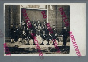 RPPC c1910 FIRE DEPARTMENT BAND Posing Fire Station Firemen MILITARY? ARMORY?