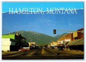 c1960's Street Scene Real Estate Mini Hall Hamilton Montana MT Postcard